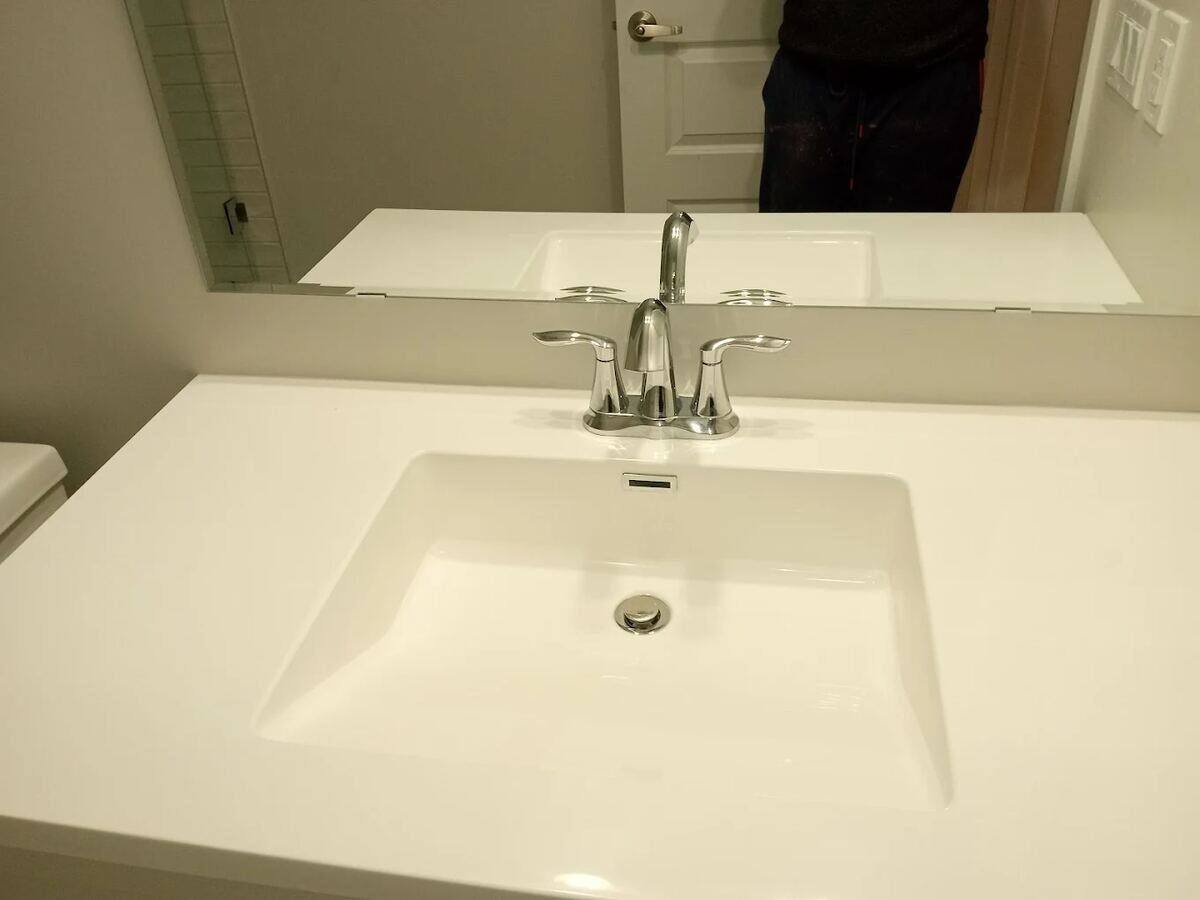 Vanity & faucet — polish to a mirror